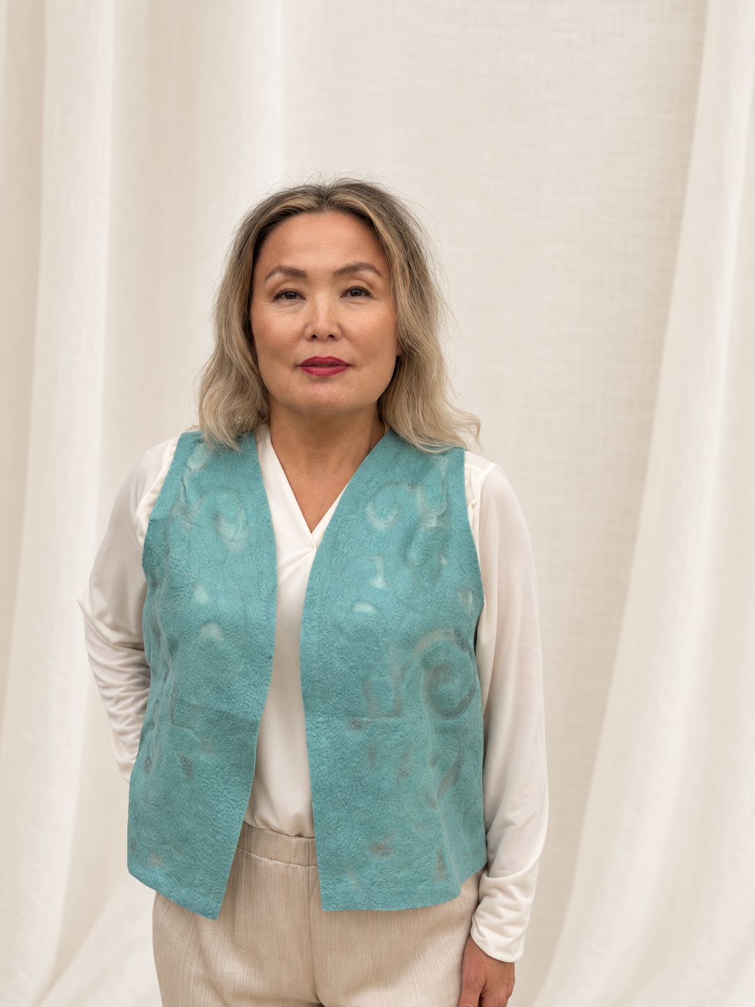 Turquoise vests handmade from natural silk and wool, view 2